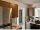 Functional kitchen equipped with stainless steel appliances and ample counter space at 1819 Collier Rd, Durham, NC 27707