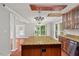 Kitchen showcasing granite countertops, hardwood floors, an island, and open design at 20 Nicklaus Way, Clayton, NC 27520
