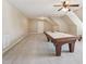 Spacious game room features a pool table, neutral paint, recessed lights and plush carpeting for a relaxing space at 204 Plantation Dr, Youngsville, NC 27596