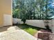 Backyard with concrete patio and a small lawn at 2069 White Pond Ct, Apex, NC 27523