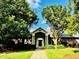 Beautiful brick clubhouse with lush landscaping and a welcoming entrance at 2069 White Pond Ct, Apex, NC 27523