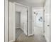 Hallway with neutral walls and carpet leading to bedrooms at 2069 White Pond Ct, Apex, NC 27523
