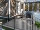 Beautiful back deck with black metal railings and room for a grill, perfect for entertaining at 2114 Cowper Dr, Raleigh, NC 27608