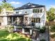 Expansive backyard featuring a well-maintained lawn and a screened porch perfect for outdoor gatherings at 2114 Cowper Dr, Raleigh, NC 27608