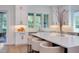 Bright and airy kitchen with stainless appliances, a large island, and seamless access to the outdoors at 2114 Cowper Dr, Raleigh, NC 27608
