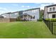 Spacious backyard featuring a well-maintained lawn and privacy fence at 217 Macy Grove Dr, Chapel Hill, NC 27517