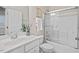 Clean bathroom with a tub, shower, modern sink, and good lighting at 217 Macy Grove Dr, Chapel Hill, NC 27517
