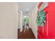 Bright foyer with hardwood floors, light walls, and an inviting view into the living room at 217 Macy Grove Dr, Chapel Hill, NC 27517