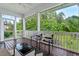 Relaxing screened porch with outdoor seating, perfect for enjoying nature at 217 Macy Grove Dr, Chapel Hill, NC 27517