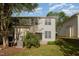 Lush backyard featuring well-maintained landscaping and building exteriors at 2261 Plum Frost Dr, Raleigh, NC 27603