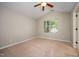 Bedroom with neutral walls, carpet, and a window at 2261 Plum Frost Dr, Raleigh, NC 27603