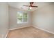 Bedroom featuring neutral walls, carpet, and a window at 2261 Plum Frost Dr, Raleigh, NC 27603