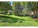 Large back yard featuring mature shade trees and plenty of space for entertainment at 2617 Cottage Cir, Raleigh, NC 27613