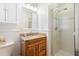 Bathroom featuring a vanity with granite counters and glass shower at 2617 Cottage Cir, Raleigh, NC 27613