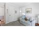 Neutral Bedroom with soft blue couch and natural light at 2617 Cottage Cir, Raleigh, NC 27613