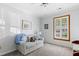 Neutral Bedroom with soft blue couch and natural light at 2617 Cottage Cir, Raleigh, NC 27613
