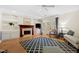Cozy living room with fireplace, built-in shelves, and French doors to the exterior at 2617 Cottage Cir, Raleigh, NC 27613
