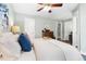 Bedroom features a tray on the bed with refreshments and hardwood floors at 2804 Barmettler St, Raleigh, NC 27607