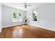 Bright bedroom with wood floors and multiple windows at 2804 Barmettler St, Raleigh, NC 27607