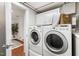 Bright laundry room with modern appliances and ample storage space at 2804 Barmettler St, Raleigh, NC 27607