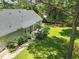 Aerial view of back of house featuring a deck and mature trees at 3109 Gold Dust Ln, Willow Springs, NC 27592