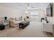 Spacious bonus room with ample seating, plush carpeting, and a ceiling fan at 3109 Gold Dust Ln, Willow Springs, NC 27592