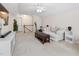 Expansive bonus room featuring a seating area, exercise equipment, and natural light at 3109 Gold Dust Ln, Willow Springs, NC 27592