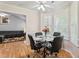 Cozy breakfast nook featuring bay window, ceiling fan, and easy access to the living room at 3109 Gold Dust Ln, Willow Springs, NC 27592