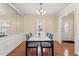 Bright dining area with ample seating and natural light, perfect for Gathering meals and entertaining at 3109 Gold Dust Ln, Willow Springs, NC 27592