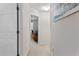 Hallway leading to a room with an office setup, and featuring neutral walls and carpeting at 3109 Gold Dust Ln, Willow Springs, NC 27592