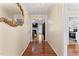 Inviting entryway featuring hardwood floors, elegant decor, and seamless transition to living spaces at 3109 Gold Dust Ln, Willow Springs, NC 27592