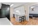 Well-lit kitchen with white cabinetry, modern appliances, and breakfast bar with stools at 3109 Gold Dust Ln, Willow Springs, NC 27592