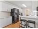 Open kitchen with modern appliances, breakfast bar, and plenty of counter space for meal preparation at 3109 Gold Dust Ln, Willow Springs, NC 27592