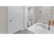 Bathroom featuring a white vanity, updated fixtures and a toilet at 326 S Parliament Way, Clayton, NC 27520