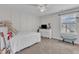 Neutral bedroom featuring carpet, a bed and ceiling fan at 326 S Parliament Way, Clayton, NC 27520