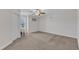 Carpeted bedroom features a window for natural light, as well as a ceiling fan at 326 S Parliament Way, Clayton, NC 27520