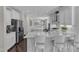 Gourmet kitchen with an open floor plan, large island, stainless appliances, and plenty of counter space at 326 S Parliament Way, Clayton, NC 27520