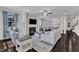 Open-concept living room featuring a fireplace, seamless flow to the dining area and lots of seating at 326 S Parliament Way, Clayton, NC 27520