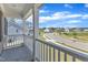 Balcony view overlooking a well-maintained street and neighborhood at 326 S Parliament Way, Clayton, NC 27520