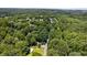 An aerial view of the property showcasing the surrounding area at 3263 S Jim Minor Rd Rd, Haw River, NC 27258