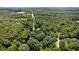 An aerial view of the wooded neighborhood at 3263 S Jim Minor Rd Rd, Haw River, NC 27258
