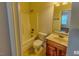 Bathroom with a vanity, mirror, toilet, and shower/tub combo at 332 Bridgegate Dr, Cary, NC 27519