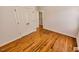 Bedroom with closet and hardwood floors at 332 Bridgegate Dr, Cary, NC 27519