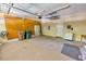 Spacious garage with ample storage, shelving and lots of room for parking at 332 Bridgegate Dr, Cary, NC 27519