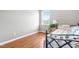 Guest bedroom featuring wood-look floors and a bright window at 3831 Abattoir Rd, Angier, NC 27501