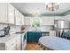 Kitchen with stainless steel appliances, ample counter space, and natural lighting at 3831 Abattoir Rd, Angier, NC 27501