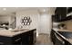 A stylish kitchen showcases an island with granite countertops and stainless steel appliances at 40 Digging Time Ave, Princeton, NC 27569