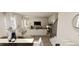 Open-concept living room and dining area with modern furnishings and natural light at 40 Digging Time Ave, Princeton, NC 27569