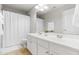 Bathroom with double sinks, generous mirror and shower at 410 Willingham Rd, Morrisville, NC 27560