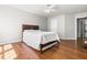 Cozy bedroom with ceiling fan, hardwood floor and closet at 410 Willingham Rd, Morrisville, NC 27560